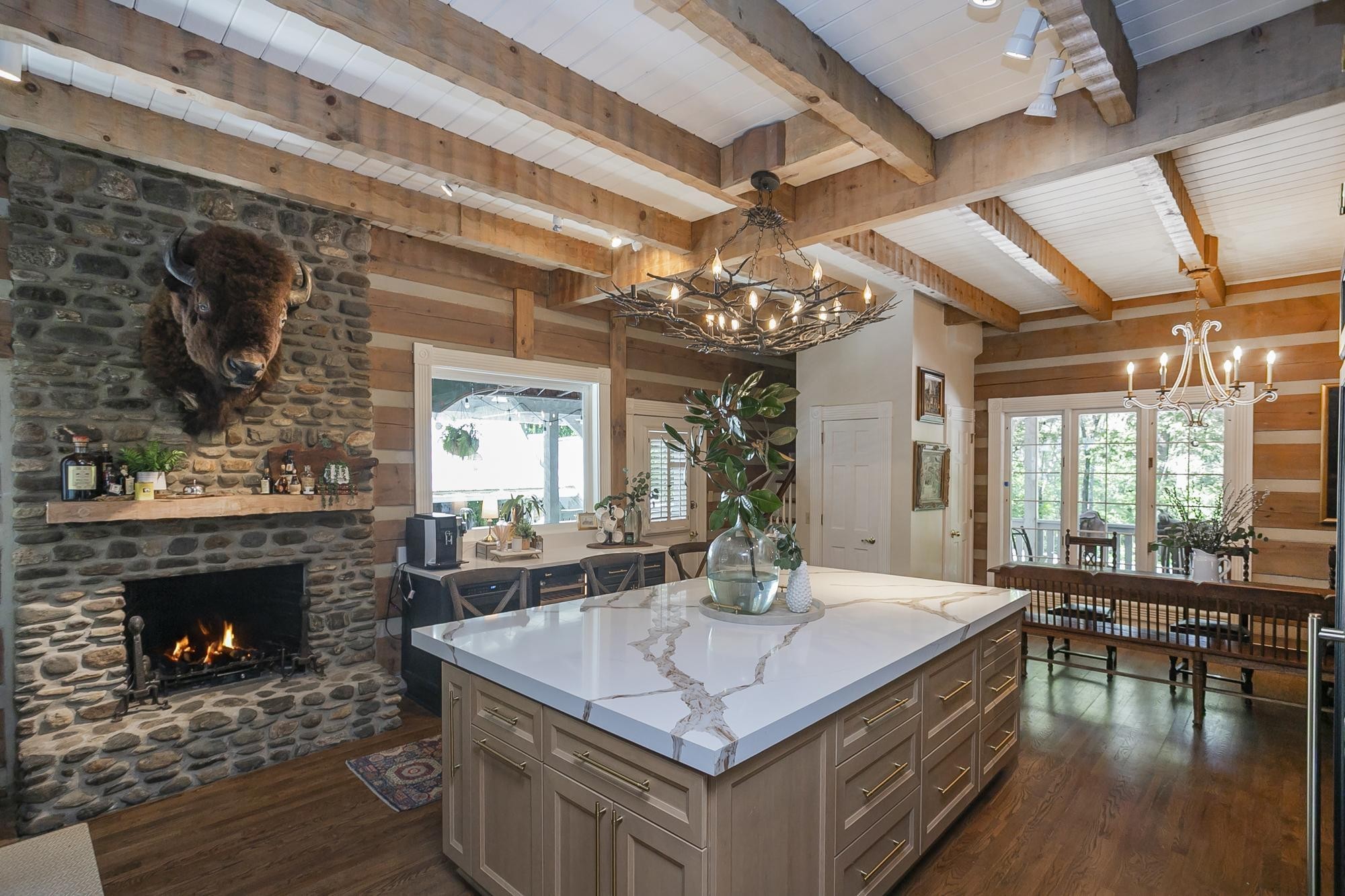 1105 Mt Pleasant Road Kingston Springs, TN 37082 - Photo 16 of 97 a living room with furniture a table and a fireplace