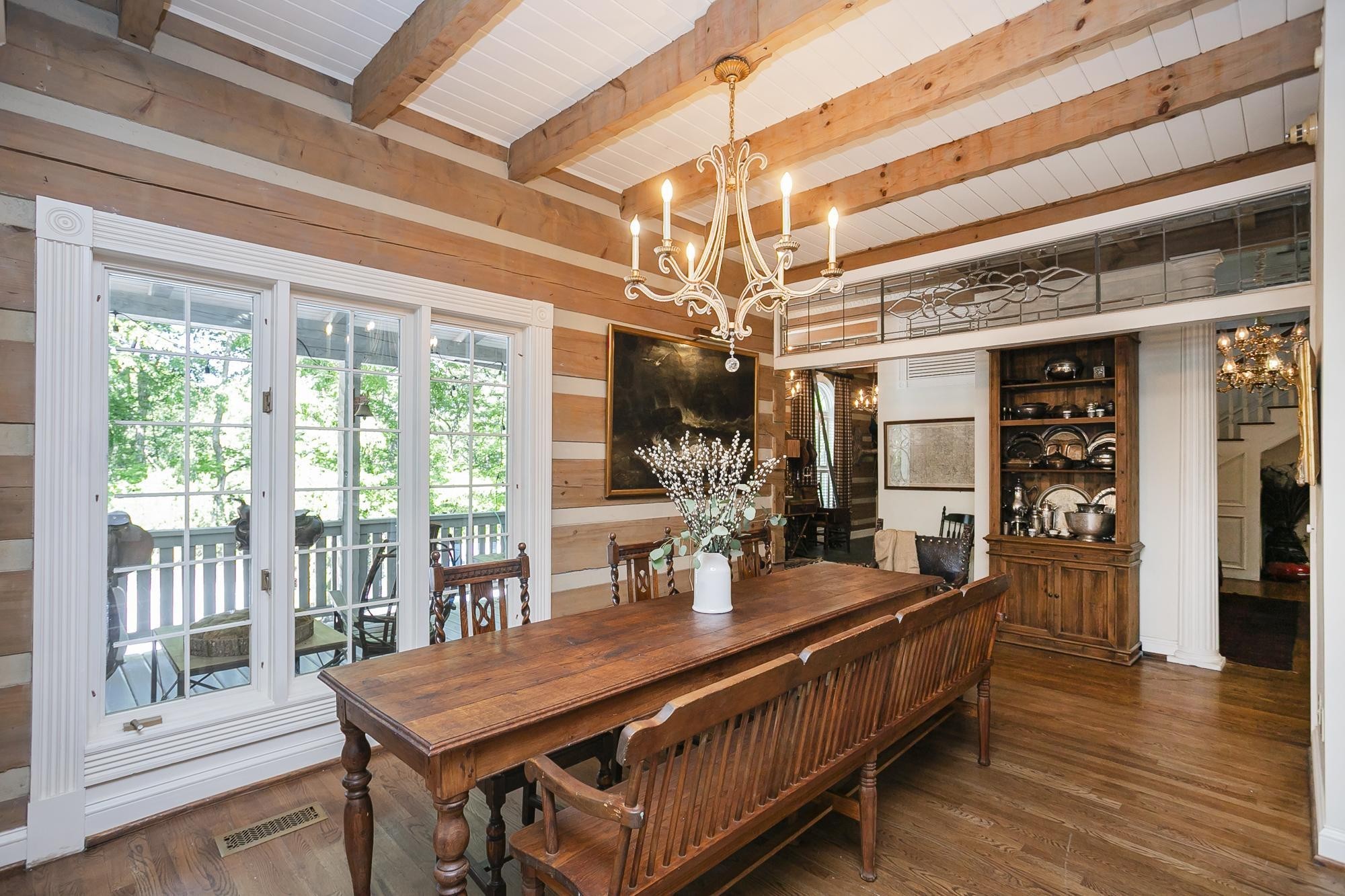 1105 Mt Pleasant Road Kingston Springs, TN 37082 - Photo 19 of 97 a outdoor dining space with furniture and wooden floor