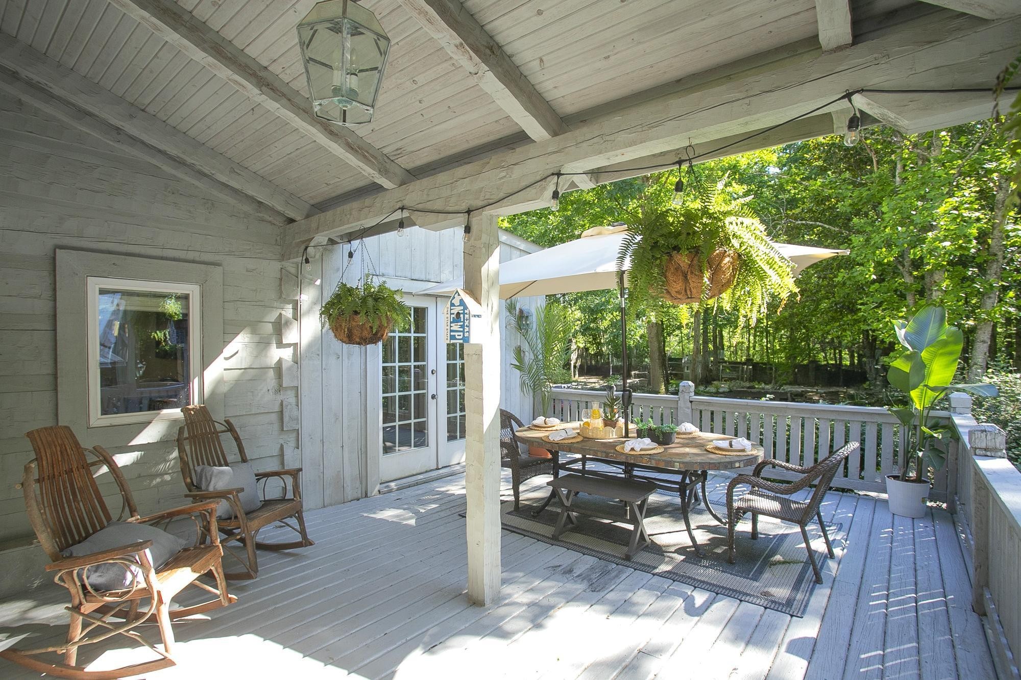 1105 Mt Pleasant Road Kingston Springs, TN 37082 - Photo 30 of 97 a outdoor space with lots of furniture and garden view