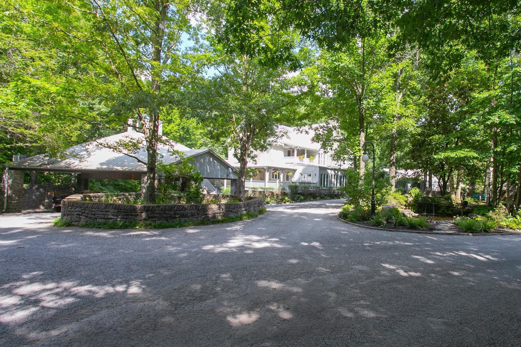 1105 Mt Pleasant Road Kingston Springs, TN 37082 - Photo 3 of 97 a view of a house with a tree and sitting area