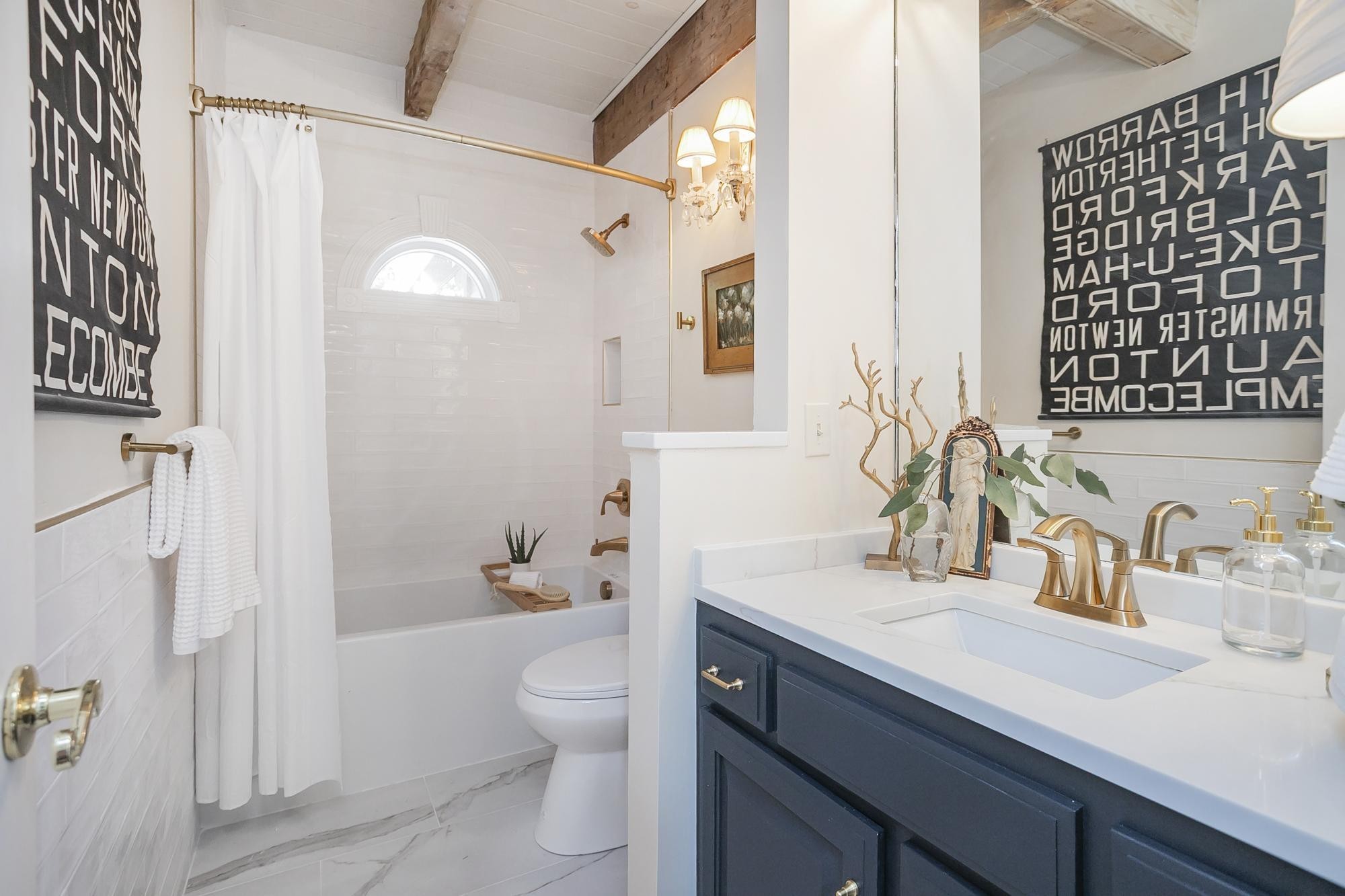 1105 Mt Pleasant Road Kingston Springs, TN 37082 - Photo 55 of 97 a bathroom with a sink a toilet and shower