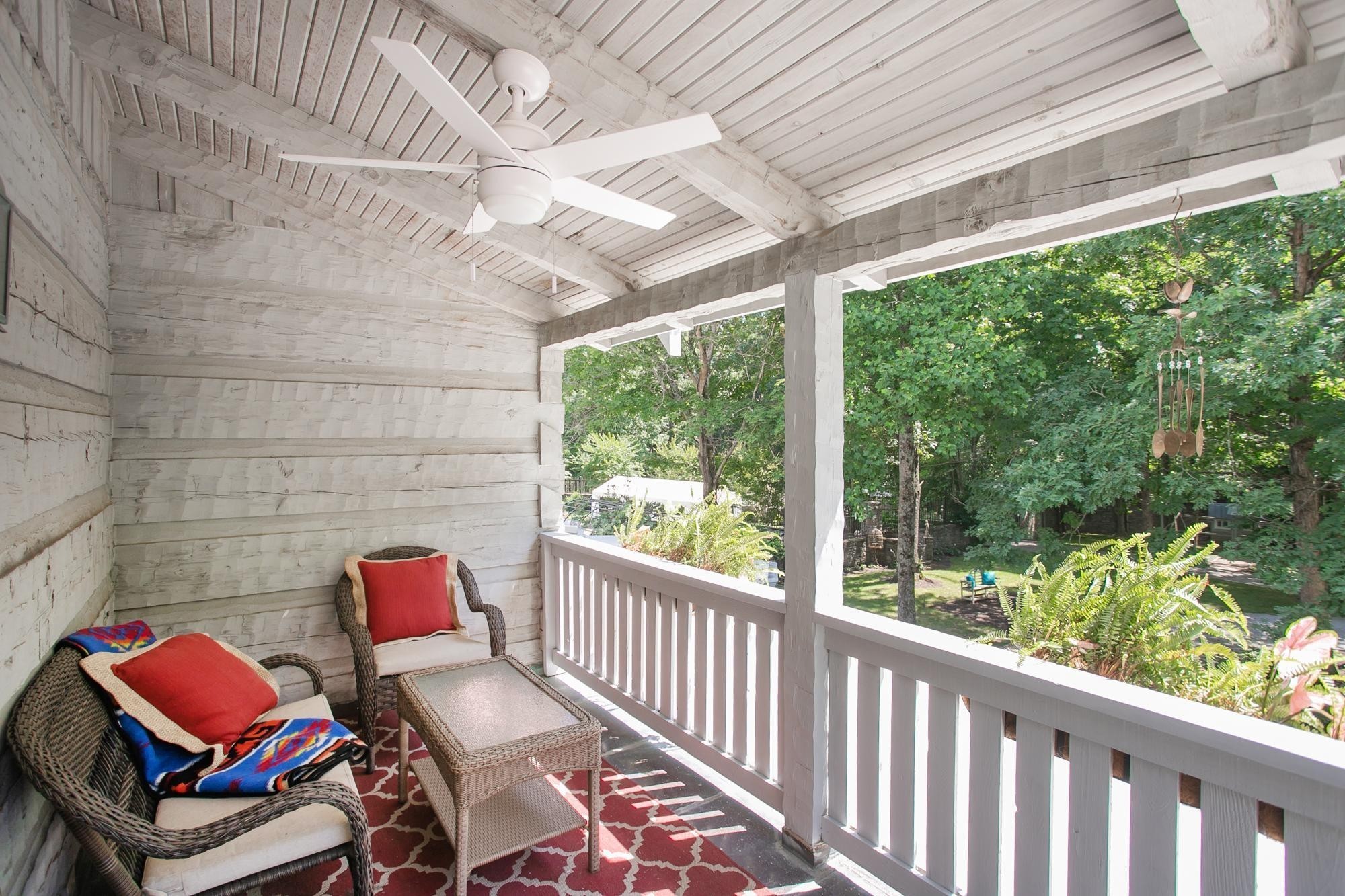 1105 Mt Pleasant Road Kingston Springs, TN 37082 - Photo 58 of 97 a outdoor living space with furniture and garden view