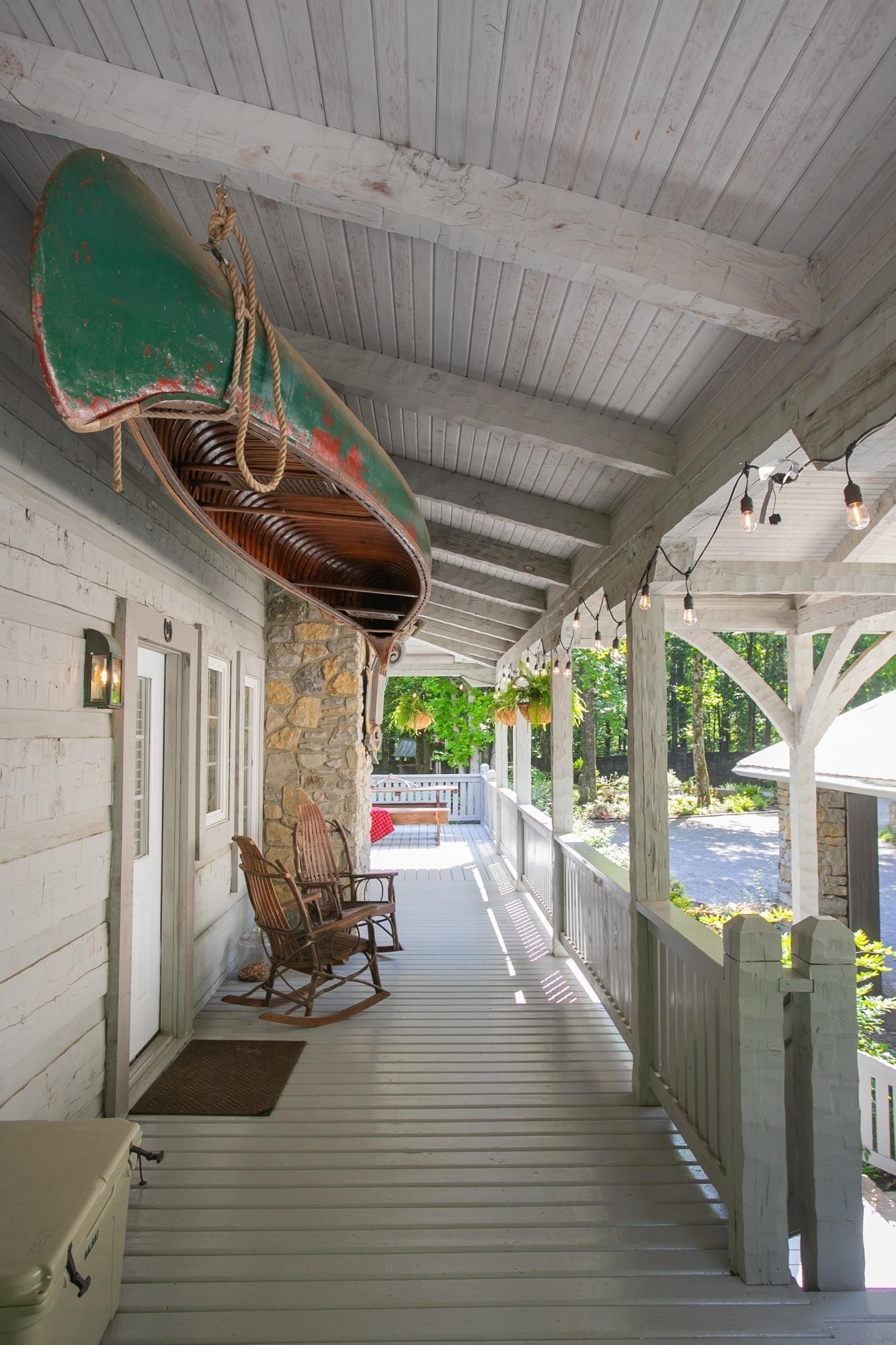 1105 Mt Pleasant Road Kingston Springs, TN 37082 - Photo 68 of 97 a view of a patio with table and chairs a barbeque with wooden floor