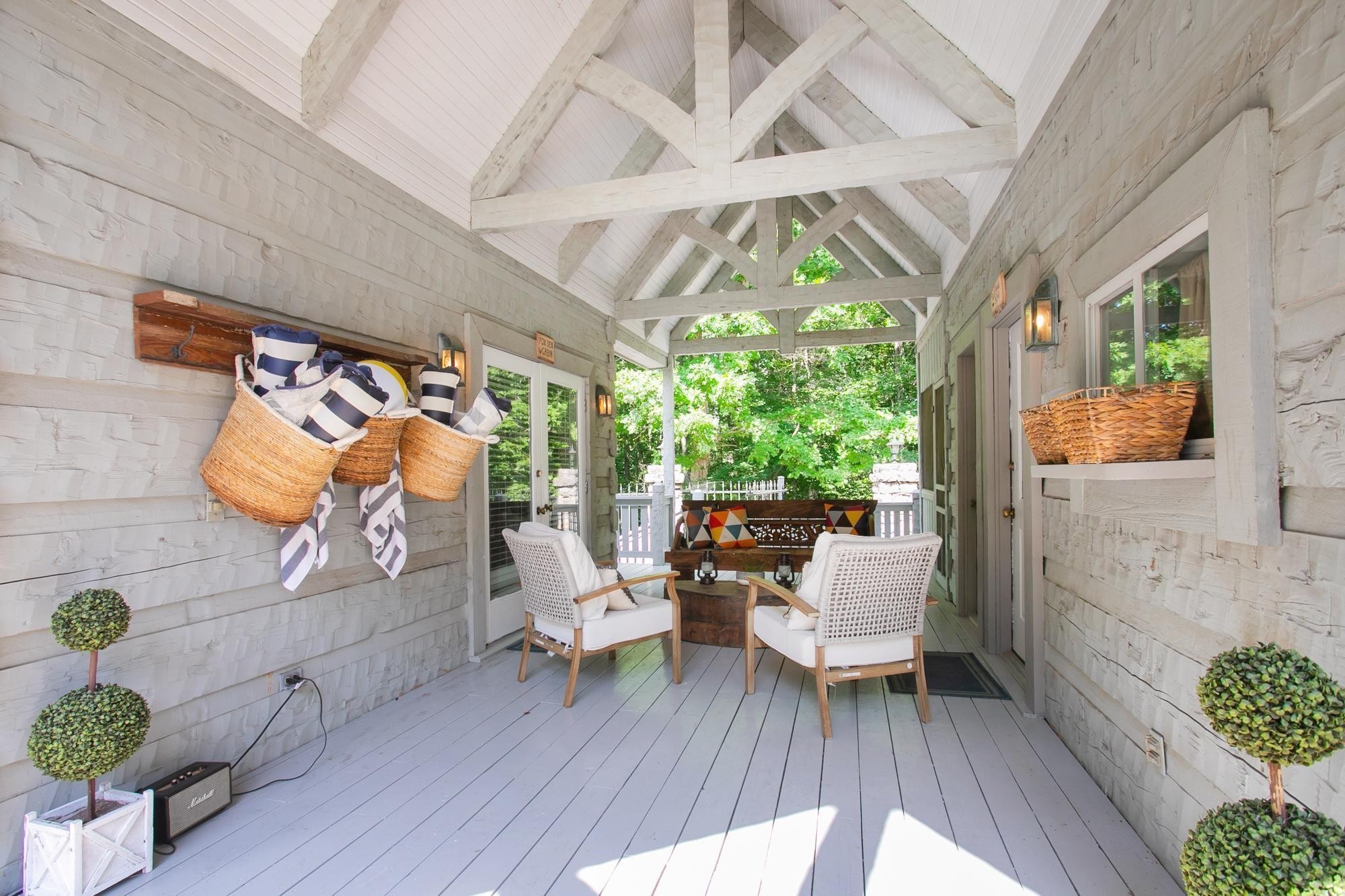 1105 Mt Pleasant Road Kingston Springs, TN 37082 - Photo 71 of 97 a living room with patio furniture and a wooden floor