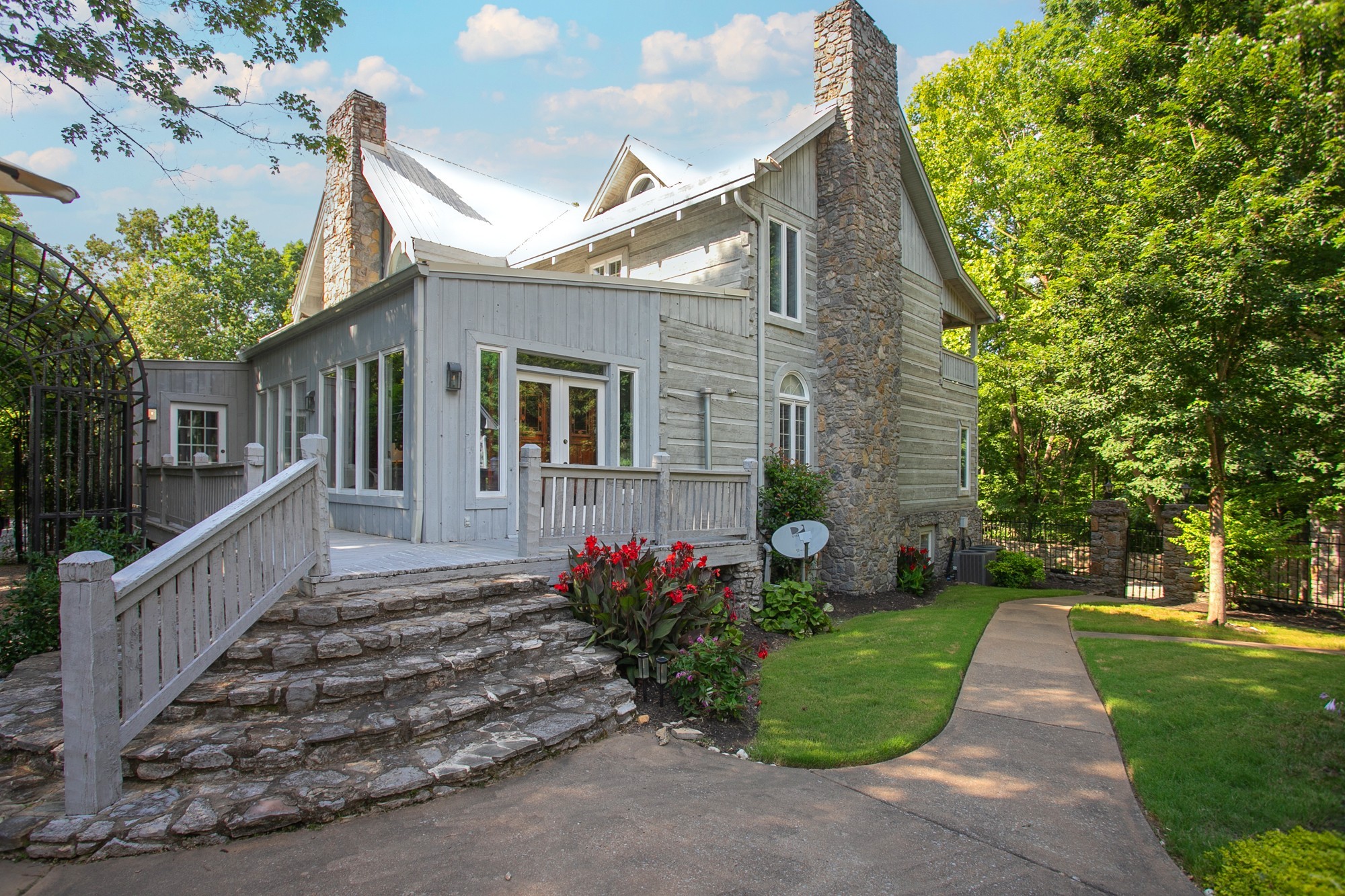 1105 Mt Pleasant Road Kingston Springs, TN 37082 - Photo 87 of 97 a front view of a house with a yard