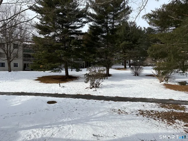 a view of an outdoor space and tennis court