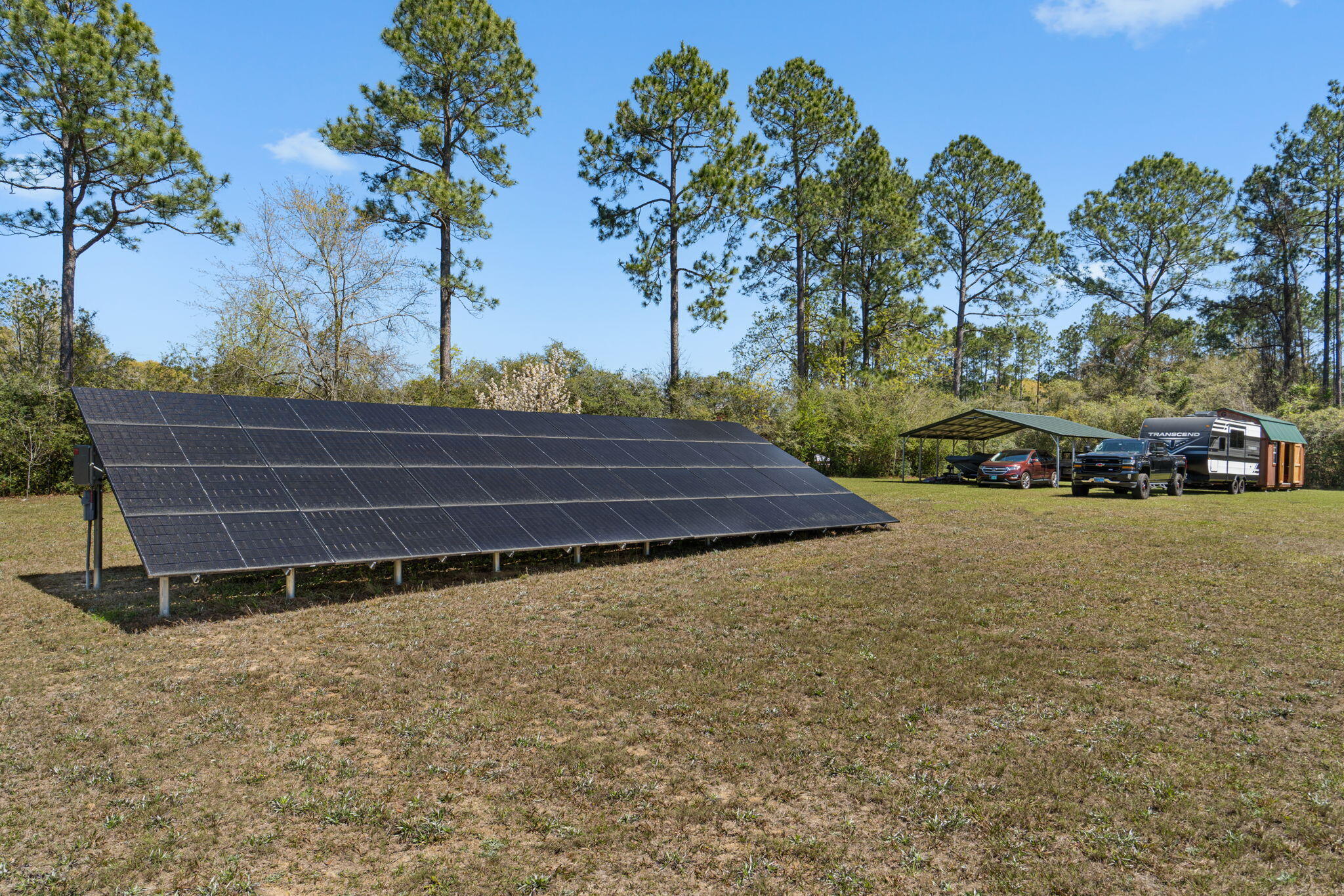 6774 Quintette Road Pace, FL 32571 - Photo 6 of 62 In ground solar panels, no cost to buyer