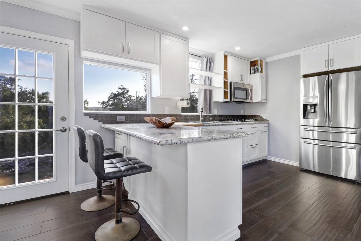 901 Thurman Road San Marcos, TX 78666 - Photo 32 of 32 Open floorplan, granite counters, bar seating