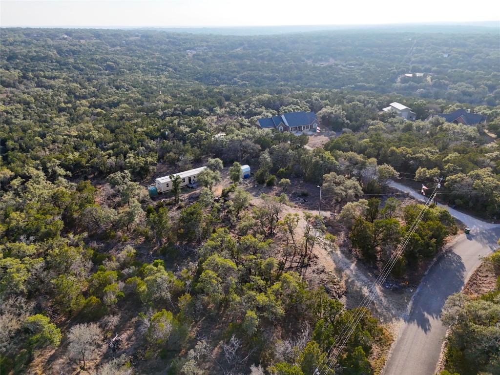 901 Thurman Road San Marcos, TX 78666 - Photo 26 of 32 Aerial view of property's location with a forest