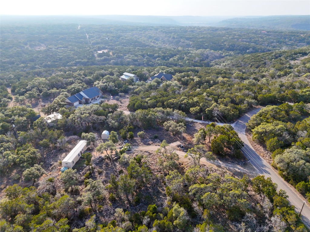901 Thurman Road San Marcos, TX 78666 - Photo 27 of 32 Aerial overview of property's location with a forest