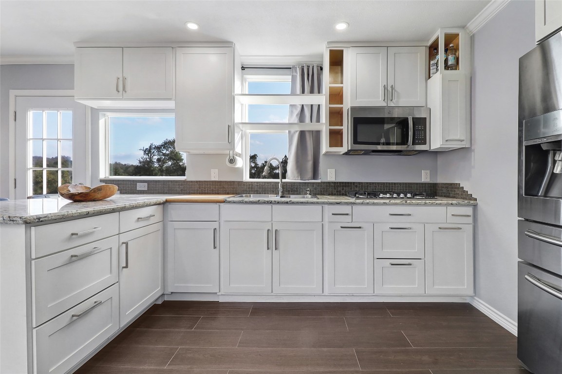 901 Thurman Road San Marcos, TX 78666 - Photo 9 of 32 Beautiful modern kitchen with hill country views