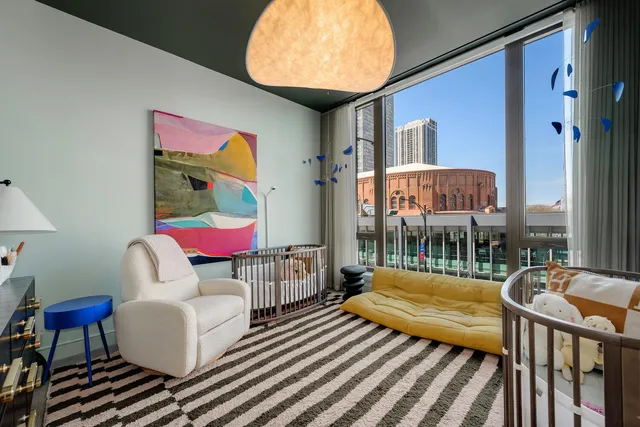 a balcony with furniture and rug