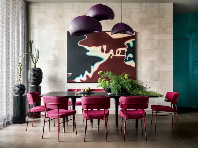 a dining room with furniture and wooden floor