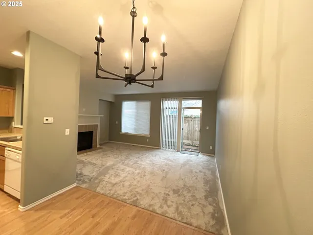 a view of a room with a chandelier