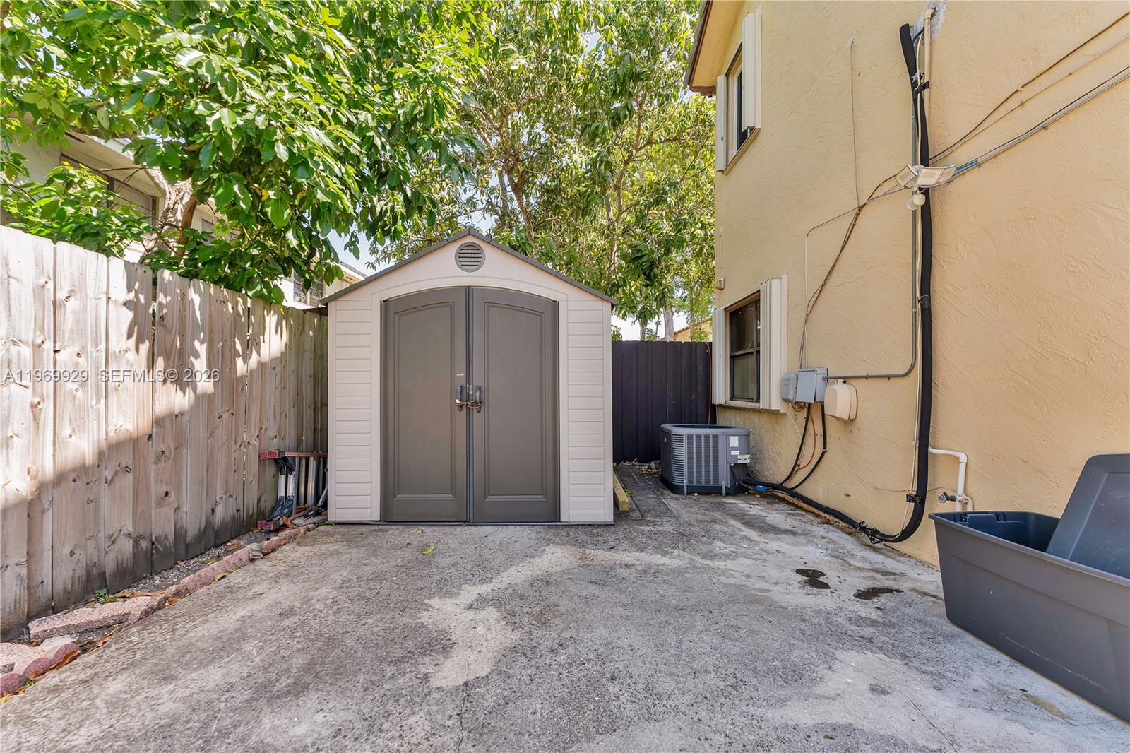 9646 Southwest 151st Avenue, Unit 1 Miami, FL 33196 - Photo 20 of 26 a front view of a house with garden