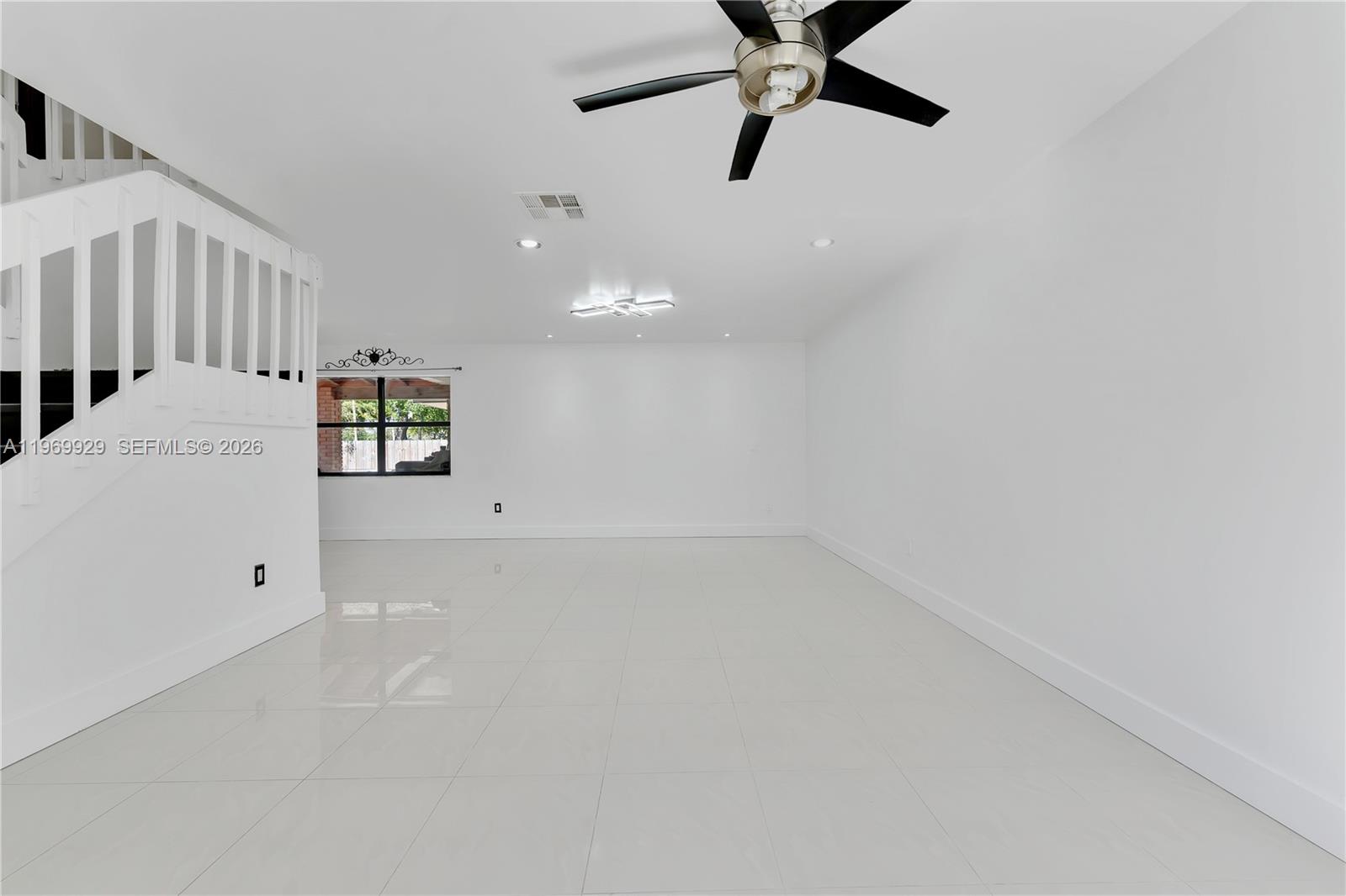 9646 Southwest 151st Avenue, Unit 1 Miami, FL 33196 - Photo 2 of 26 a view of an empty room