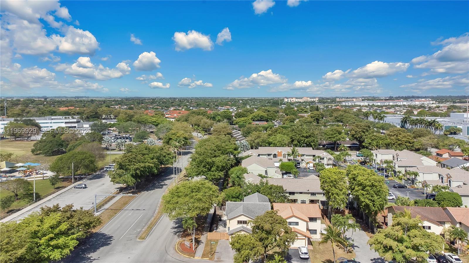 9646 Southwest 151st Avenue, Unit 1 Miami, FL 33196 - Photo 24 of 26 an aerial view of a city