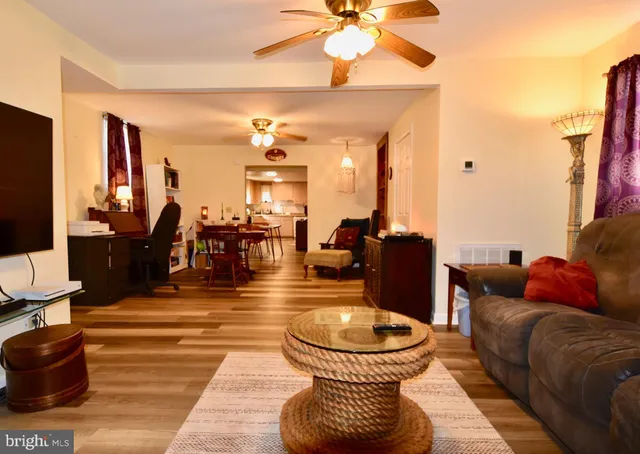 a kitchen with a sink a stove and cabinets