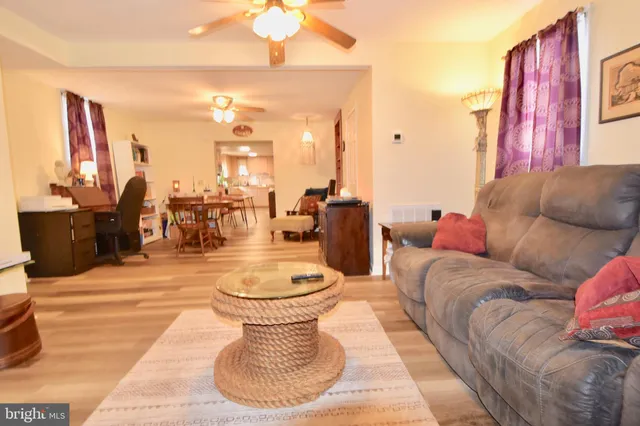 a kitchen with a stove a sink and a microwave
