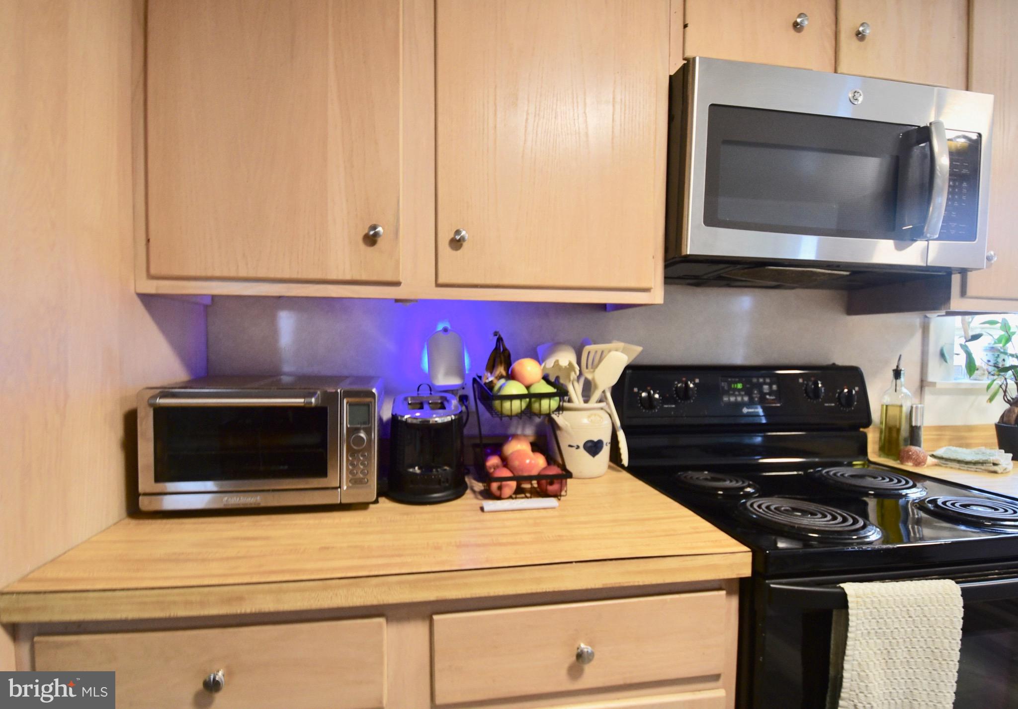 211 Choptank Avenue Cambridge, MD 21613 - Photo 20 of 57 a kitchen with a stove and microwave