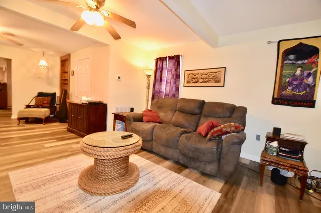 a kitchen with a sink stove top oven and cabinets