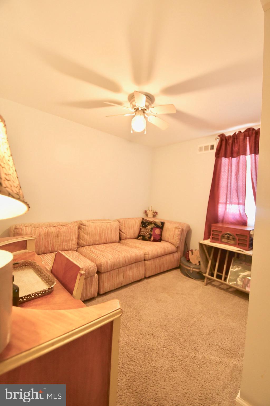 211 Choptank Avenue Cambridge, MD 21613 - Photo 30 of 52 a living room with furniture and a couch