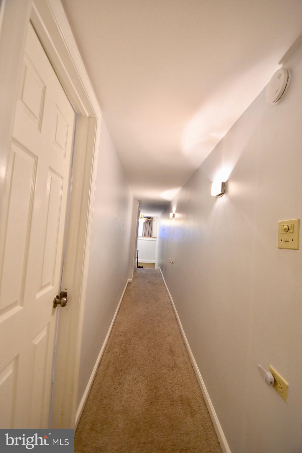 211 Choptank Avenue Cambridge, MD 21613 - Photo 33 of 57 a view of a hallway with wooden floor