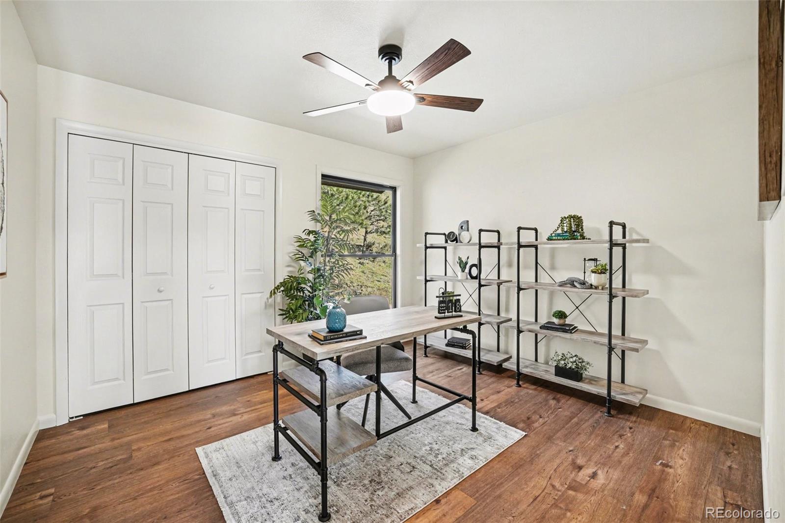 3260 Bit Road Evergreen, CO 80439 - Photo 13 of 26 a work room with furniture and a window
