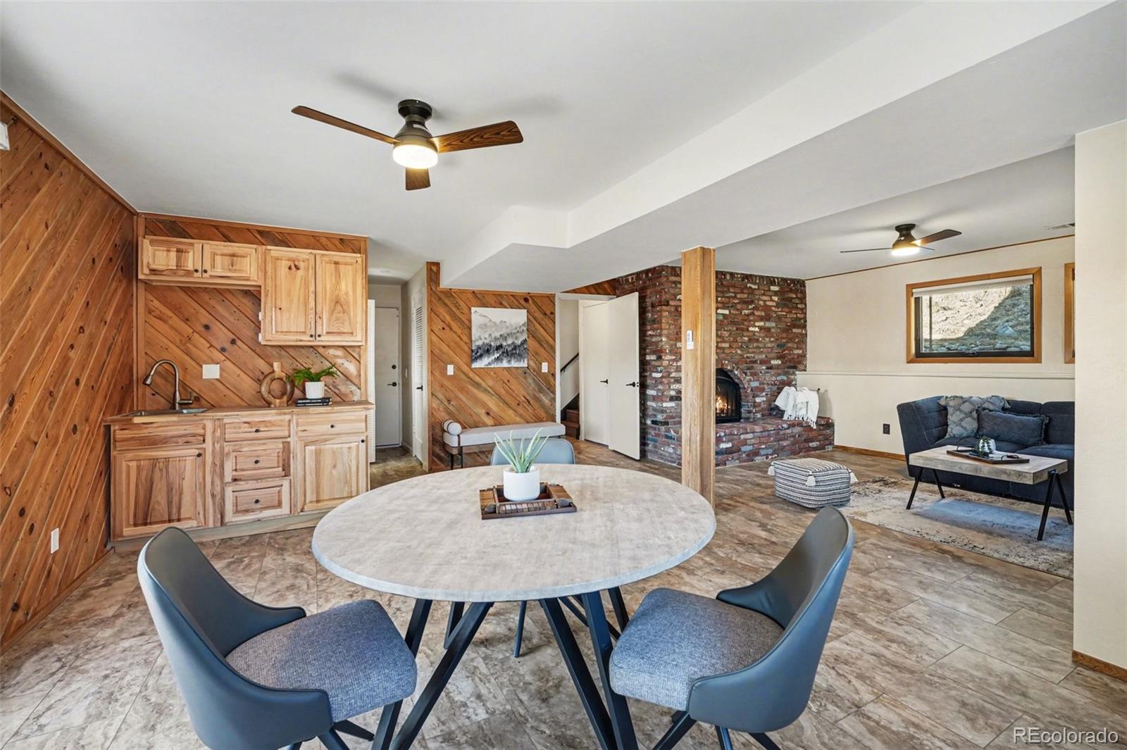 3260 Bit Road Evergreen, CO 80439 - Photo 17 of 26 a view of a dining room with furniture window and outside view