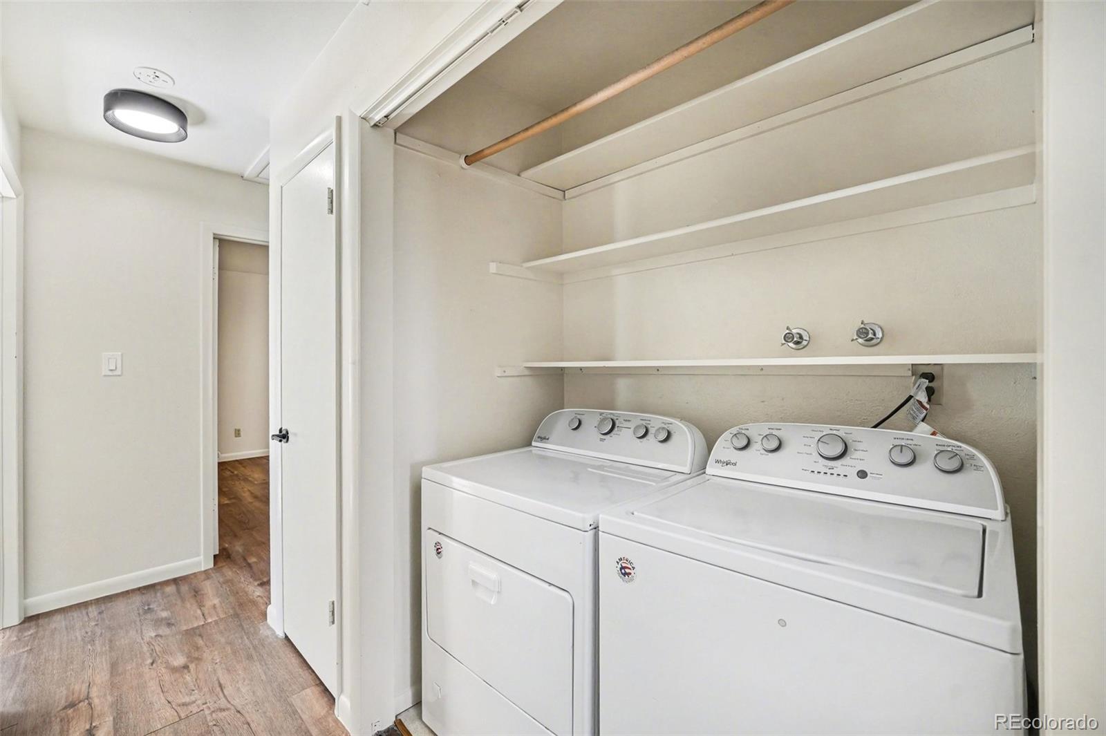 3260 Bit Road Evergreen, CO 80439 - Photo 20 of 26 a utility room with dryer and washer