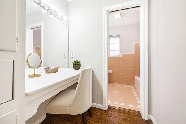 a view of bathroom with a shower and a sink
