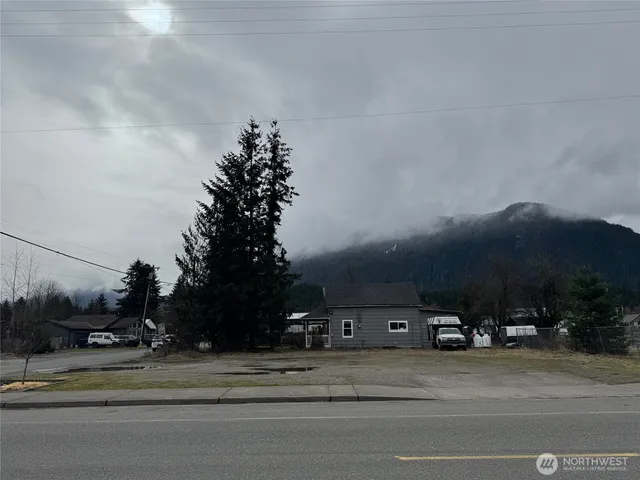 a view of a street with a houses