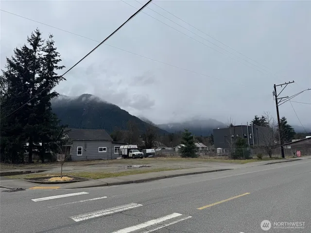 a view of street with houses