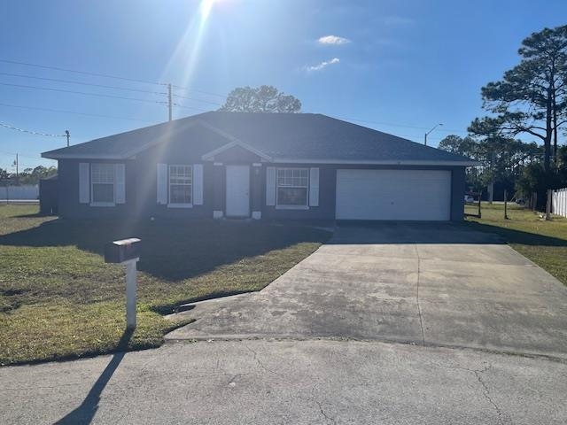 14 Random Place Palm Coast, FL 32164 - Photo 1 of 25 a backyard of a house