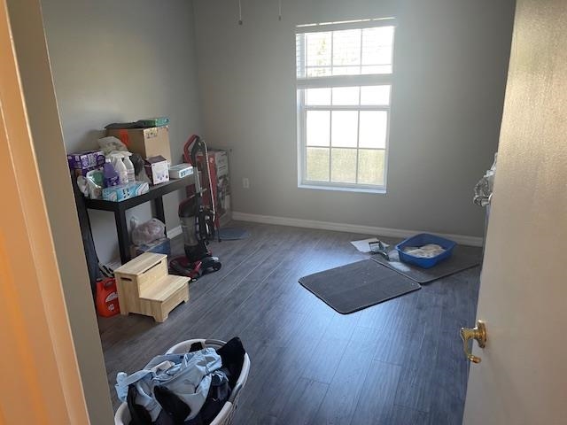 14 Random Place Palm Coast, FL 32164 - Photo 14 of 25 a room with furniture and a wooden floor