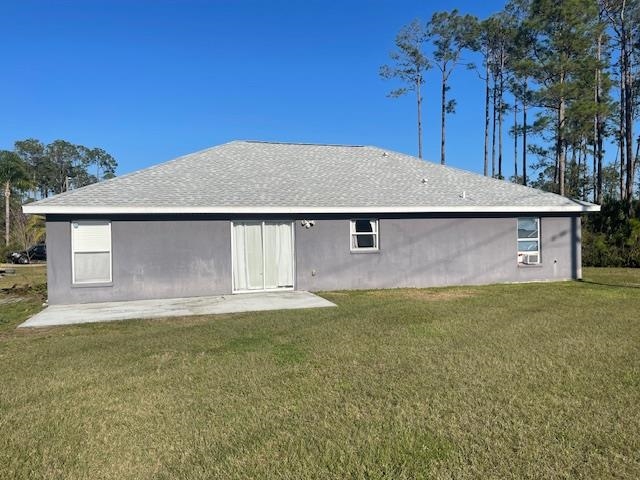 14 Random Place Palm Coast, FL 32164 - Photo 20 of 25 a backyard of a house