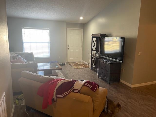 14 Random Place Palm Coast, FL 32164 - Photo 2 of 25 a living room with furniture and a flat screen tv