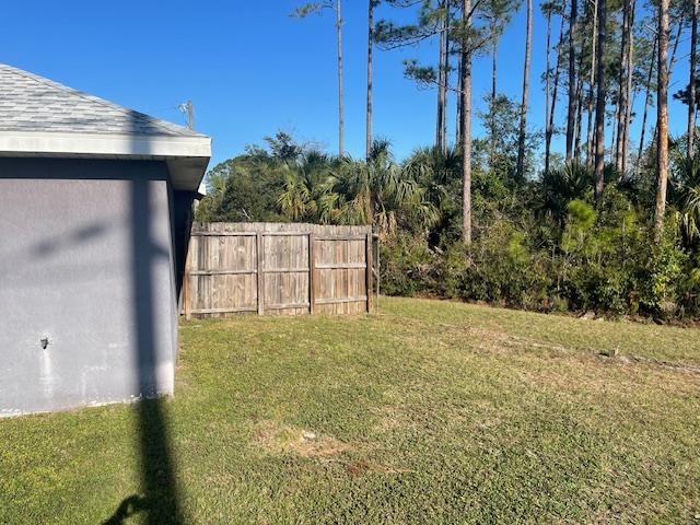 14 Random Place Palm Coast, FL 32164 - Photo 23 of 25 a backyard of a house