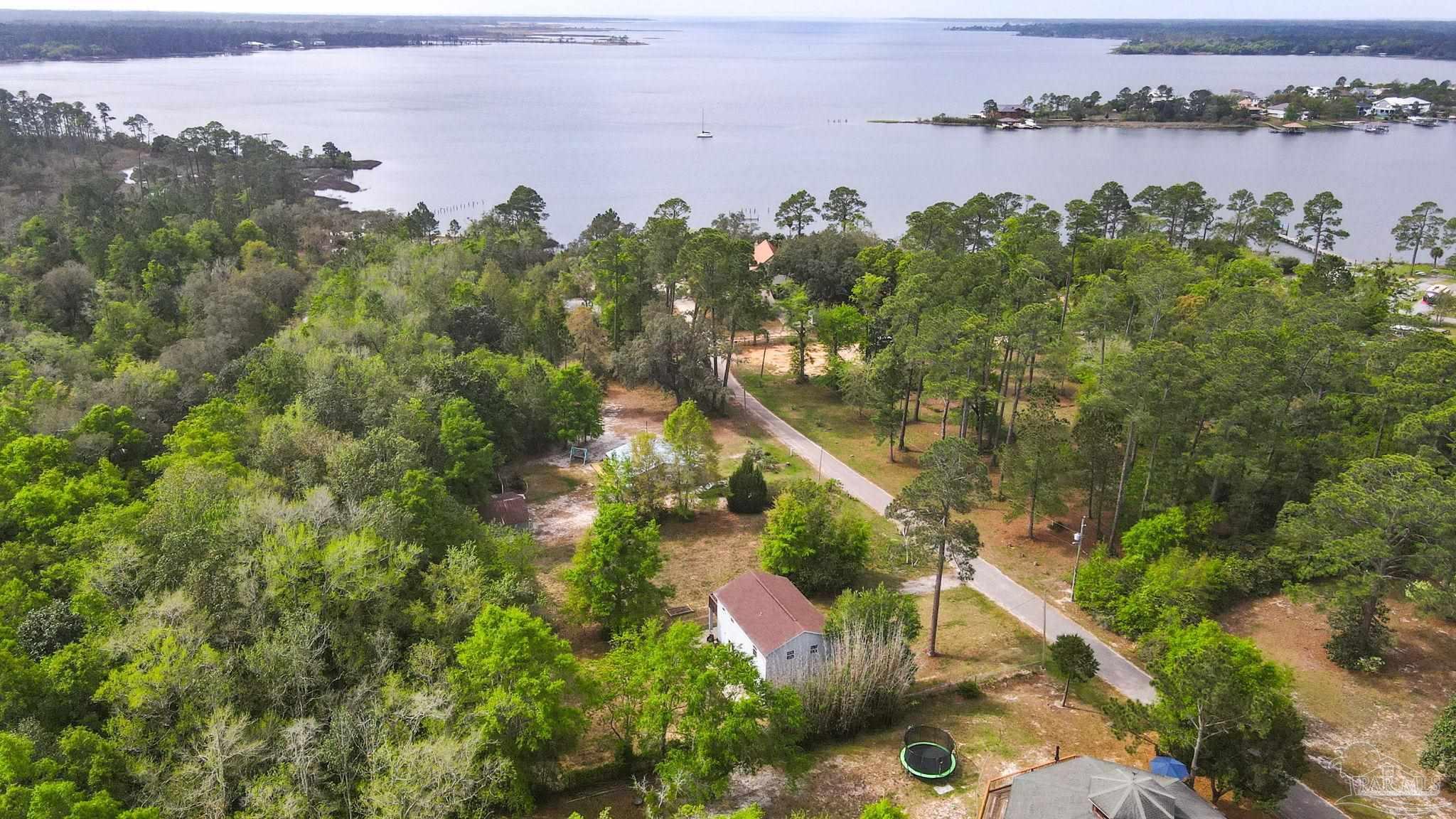 4032 Mae Lane Milton, FL 32583 - Photo 40 of 50 an aerial view of multiple house