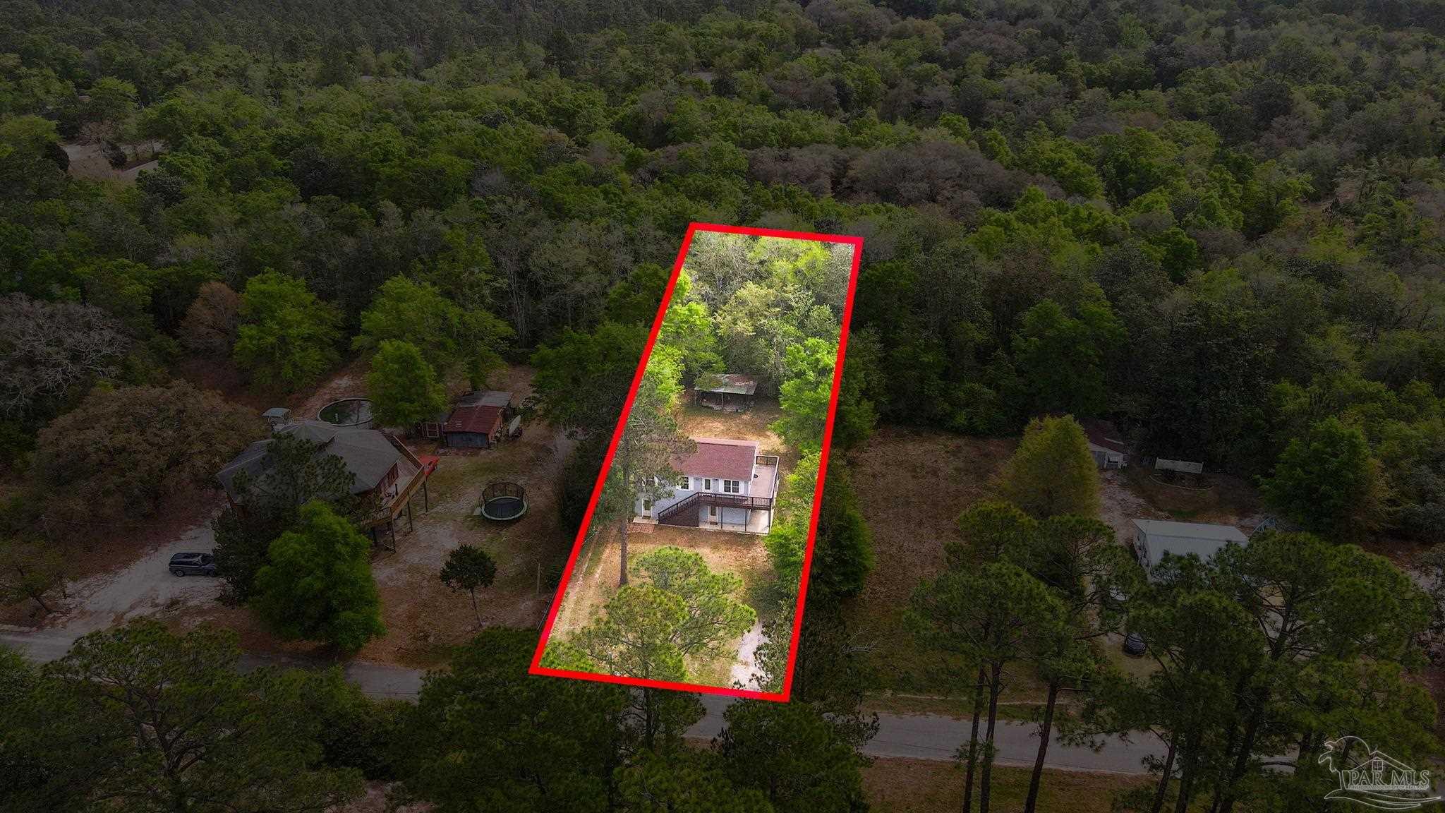 4032 Mae Lane Milton, FL 32583 - Photo 45 of 50 an aerial view of a house