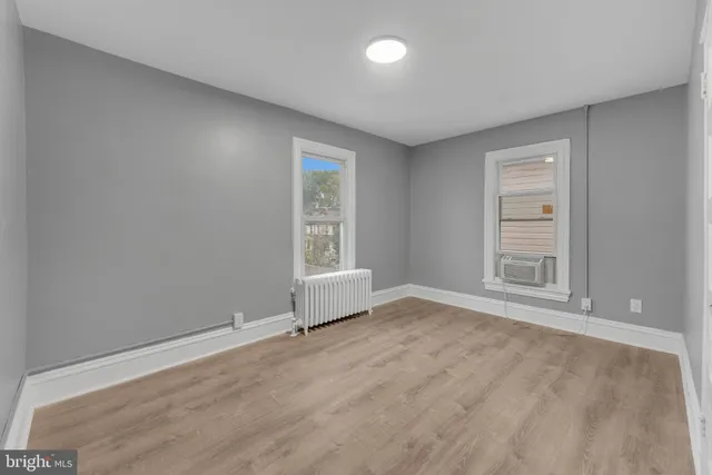 a view of a hallway with a window