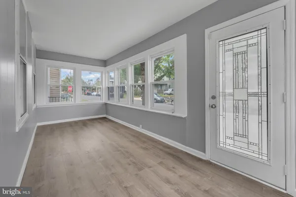 an empty room with windows