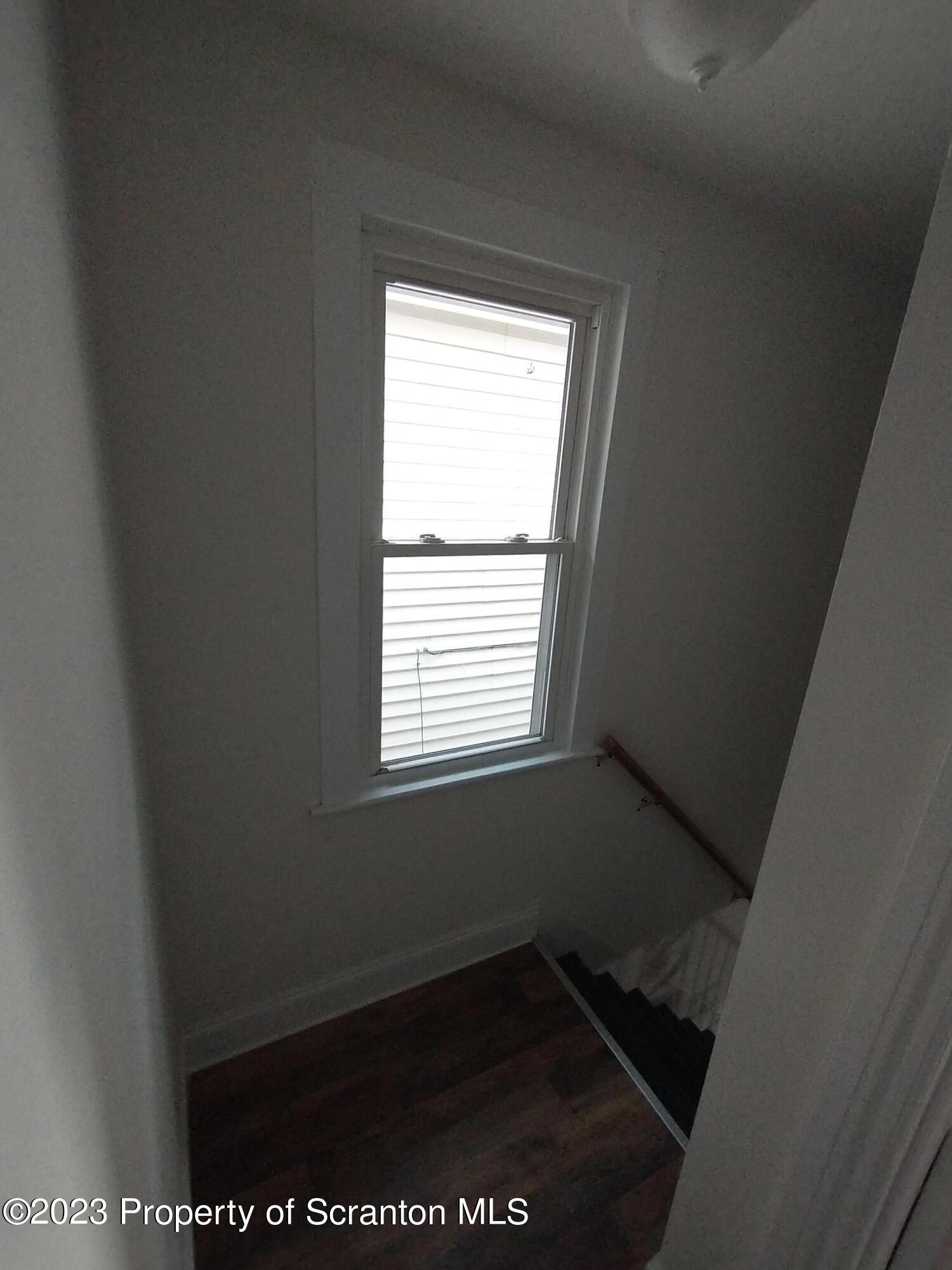 1604 Hawthorne Street Scranton, PA 18504 - Photo 7 of 11 a view of an empty room with a window