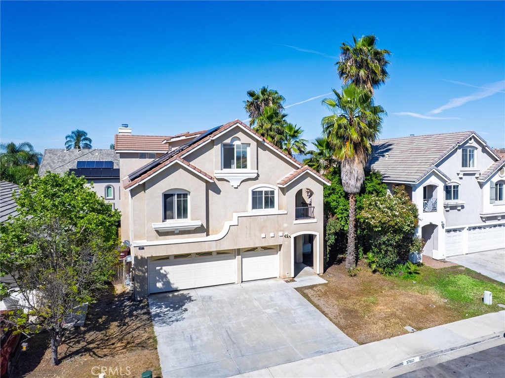 37867 Shady Maple Road Murrieta, CA 92563 - Photo 57 of 68 a house that has a tree in front of the house