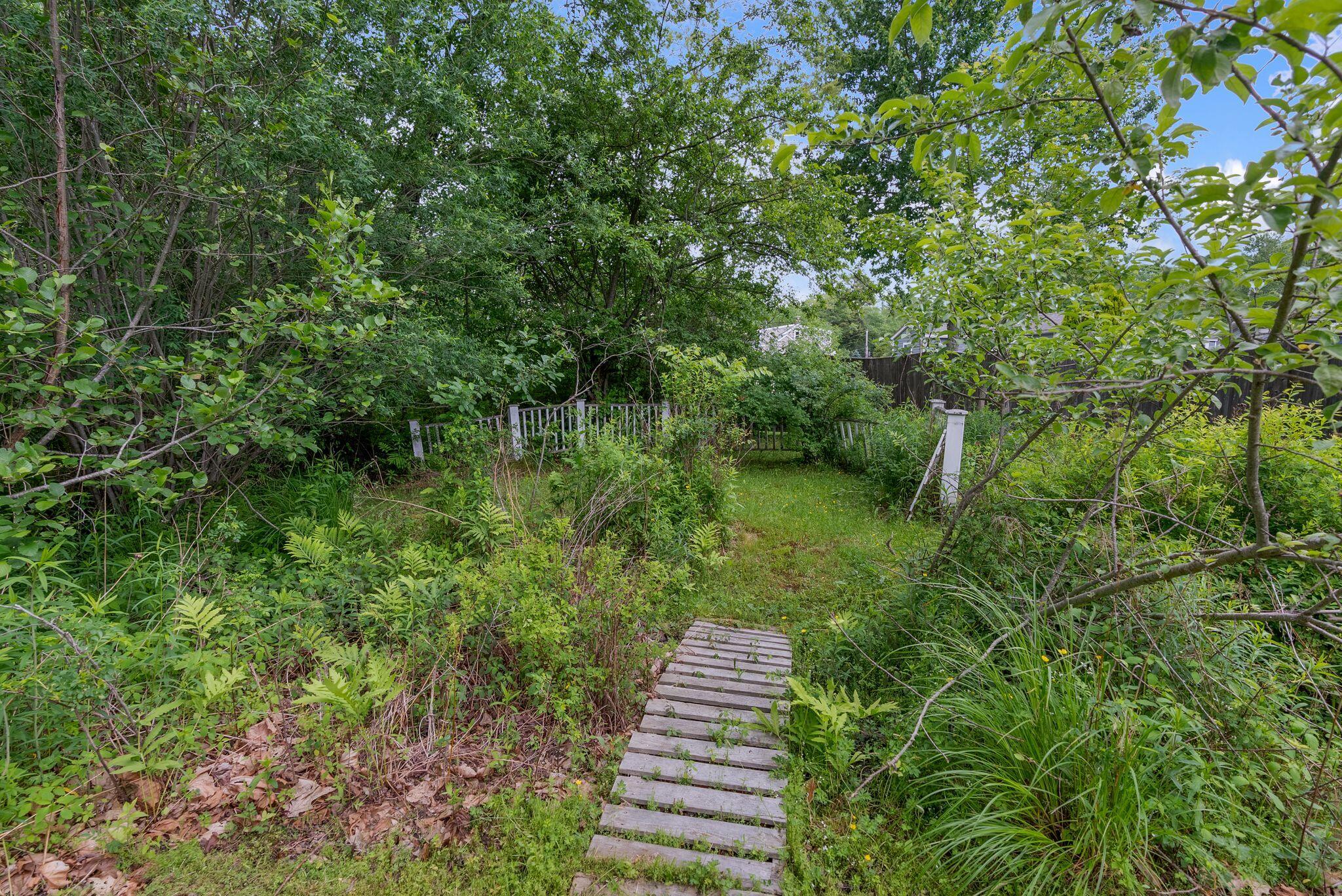 85 Old Port Road Kennebunk, ME 04043 - Photo 26 of 33 Bridge to Secret Garden