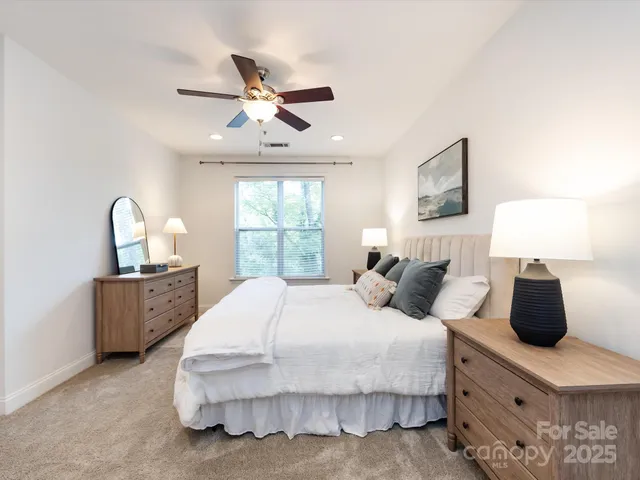 a bedroom with bed and window