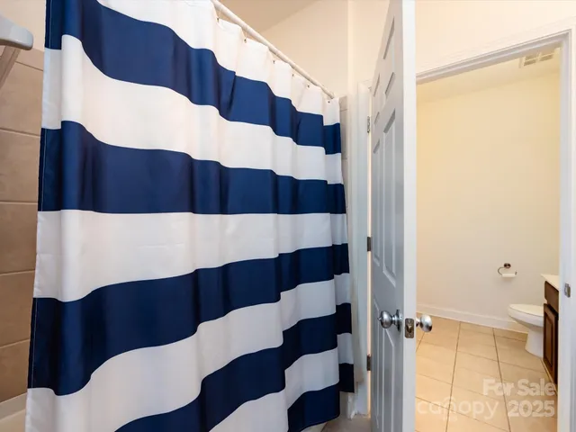 a view of balcony with wooden floor