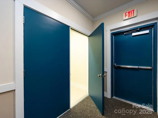 a view of elevator with hallway