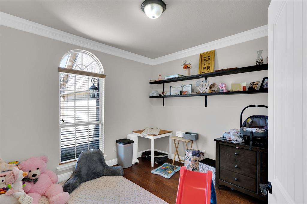 129 Micco Lane Fate, TX 75087 - Photo 25 of 31 a room with a workspace