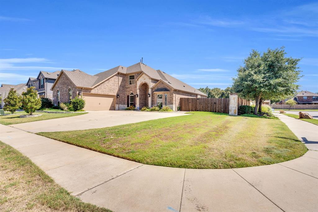 129 Micco Lane Fate, TX 75087 - Photo 30 of 31 a view of outdoor space yard and front view of a house